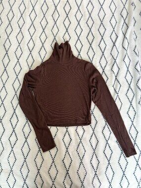 Medium brown long-sleeve, ribbed turtleneck crop top
